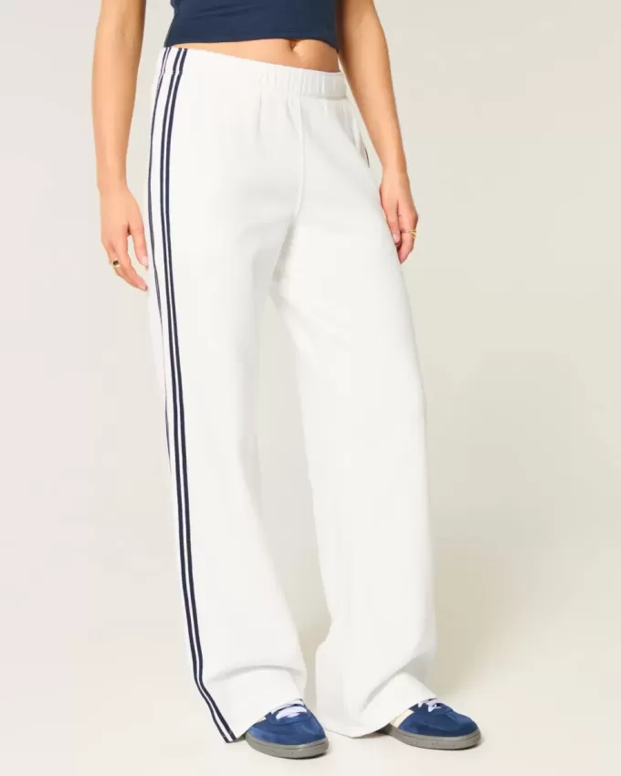 Pantaloni de sport cu picioare largi în dungi Pantaloni de sport cu picioare largi în dungi