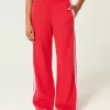 Pantaloni de sport cu picioare largi în dungi Pantaloni de sport cu picioare largi în dungi