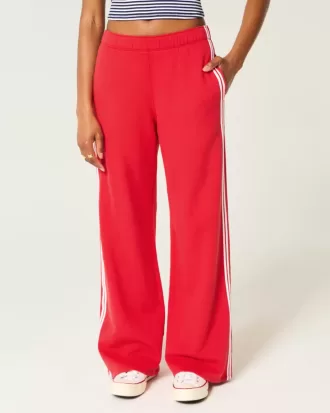 Pantaloni de sport cu picioare largi în dungi