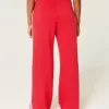 Pantaloni de sport cu picioare largi în dungi Pantaloni de sport cu picioare largi în dungi