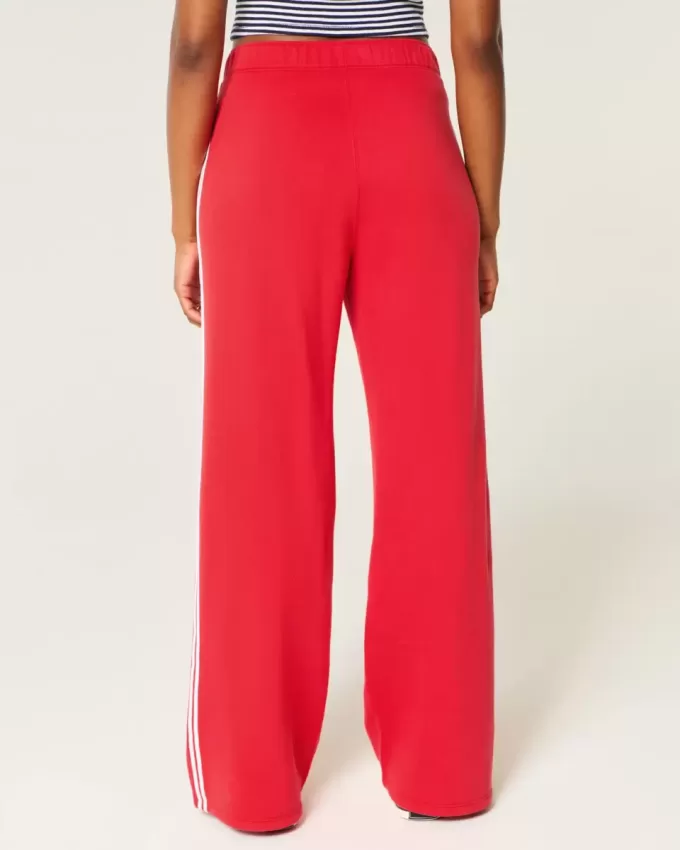 Pantaloni de sport cu picioare largi în dungi Pantaloni de sport cu picioare largi în dungi