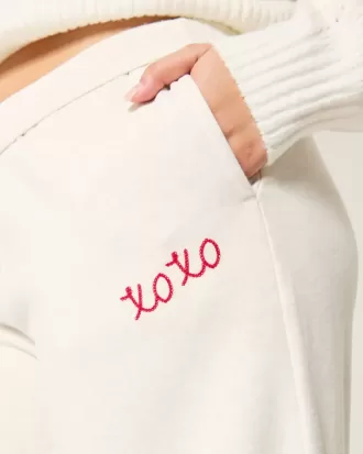 Pantaloni de sport cu picioare largi XOXO grafic