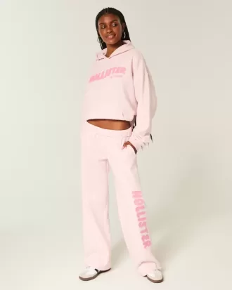 Pantaloni de sport cu sigla cu picioare largi