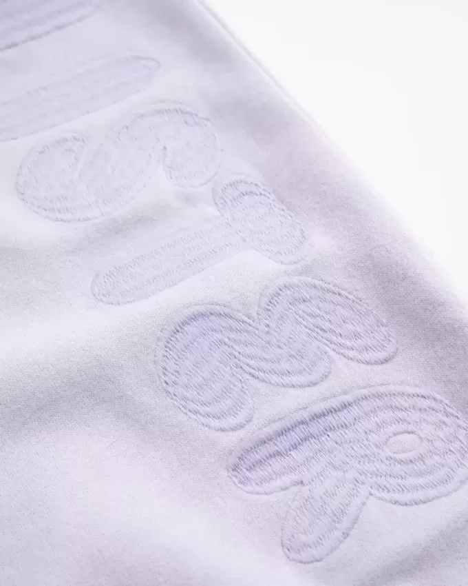 Pantaloni de sport cu sigla cu picioare largi Pantaloni de sport cu sigla cu picioare largi