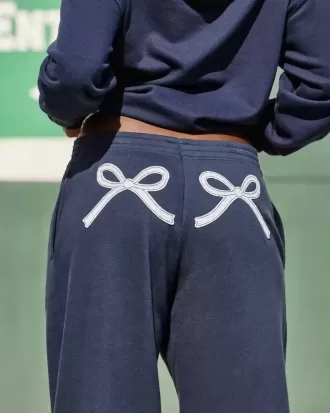 Pantaloni de sport largi cu funda grafică Pantaloni de sport largi cu funda grafică