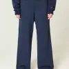 Pantaloni de sport largi cu funda grafică Pantaloni de sport largi cu funda grafică