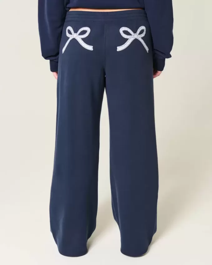 Pantaloni de sport largi cu funda grafică Pantaloni de sport largi cu funda grafică