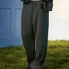 Pantaloni de sport largi cu grafică șarpe Pantaloni de sport largi cu grafică șarpe
