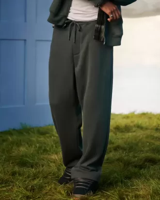 Pantaloni de sport largi cu grafică șarpe