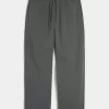 Pantaloni de sport largi cu grafică șarpe Pantaloni de sport largi cu grafică șarpe