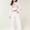 Pantaloni de sport largi cu grafic Star Pantaloni de sport largi cu grafic Star