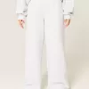Pantaloni de sport largi cu grafic Star Pantaloni de sport largi cu grafic Star