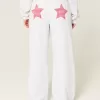 Pantaloni de sport largi cu grafic Star Pantaloni de sport largi cu grafic Star