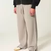 Pantaloni de sport super largi Y2K cu tiv despicat Pantaloni de sport super largi Y2K cu tiv despicat