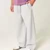 Pantaloni de sport super largi Y2K cu tiv despicat Pantaloni de sport super largi Y2K cu tiv despicat