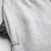Pantaloni de sport super largi Y2K cu tiv despicat Pantaloni de sport super largi Y2K cu tiv despicat