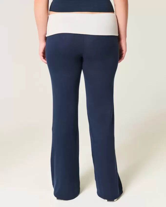 Pantaloni evazați din tricot cu talie pliabilă Pantaloni evazați din tricot cu talie pliabilă