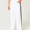 Pantaloni largi cu dungi Pantaloni largi cu dungi