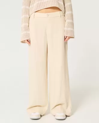 Pantaloni largi cu talie joasă