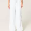 Pantaloni largi cu talie joasă Pantaloni largi cu talie joasă