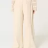 Pantaloni largi cu talie joasă Pantaloni largi cu talie joasă
