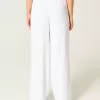 Pantaloni largi cu talie joasă Pantaloni largi cu talie joasă