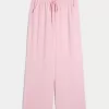 Pantaloni largi cu talie joasă Pantaloni largi cu talie joasă