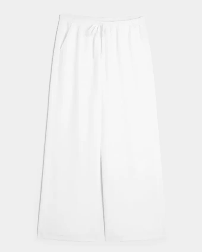 Pantaloni largi cu talie joasă Pantaloni largi cu talie joasă