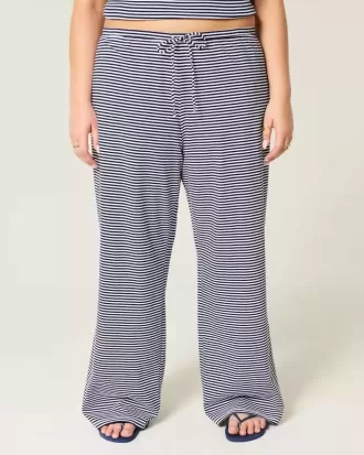 Pantaloni largi cu tragere din tricot