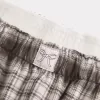 Pantaloni largi de flanel Pantaloni largi de flanel
