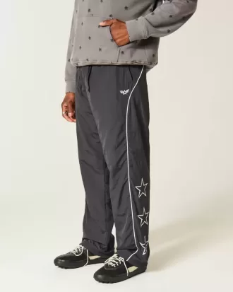 Pantaloni largi de sport