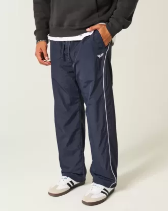 Pantaloni largi de sport
