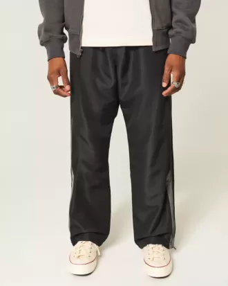 Pantaloni largi de sport