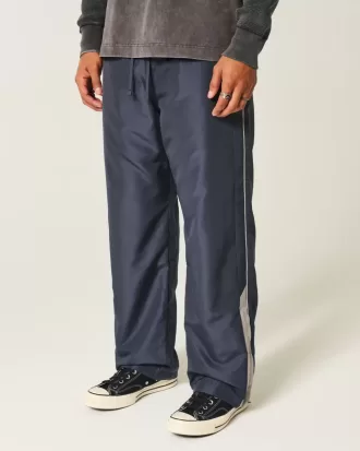Pantaloni largi de sport