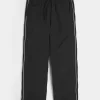 Pantaloni largi de sport