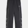 Pantaloni largi de sport Pantaloni largi de sport