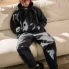 Pantaloni largi de sport