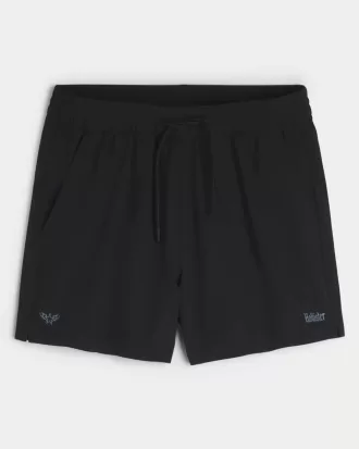 Pantaloni scurți activi cu logo la jumătatea coapsei
