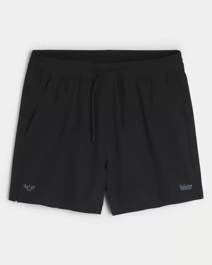 Pantaloni scurți activi cu logo la jumătatea coapsei