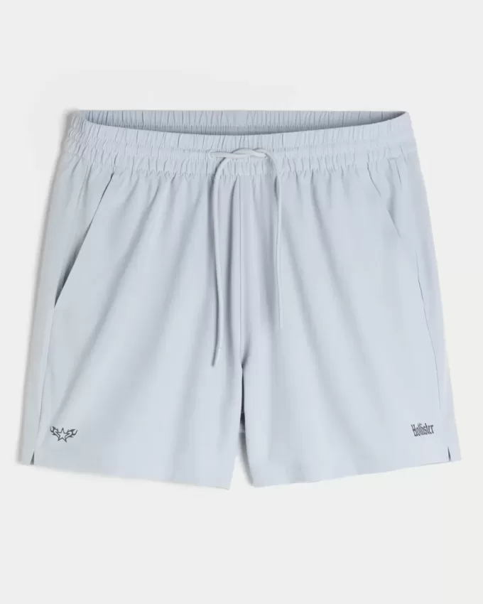 Pantaloni scurți activi cu logo la jumătatea coapsei