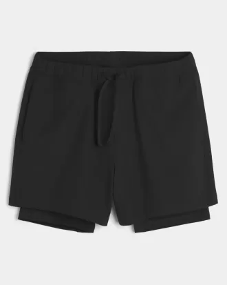 Pantaloni scurți activi hibridi la jumătatea coapsei