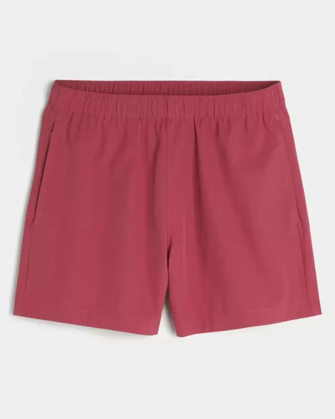 Pantaloni scurți activi hibridi la jumătatea coapsei Pantaloni scurți activi hibridi la jumătatea coapsei
