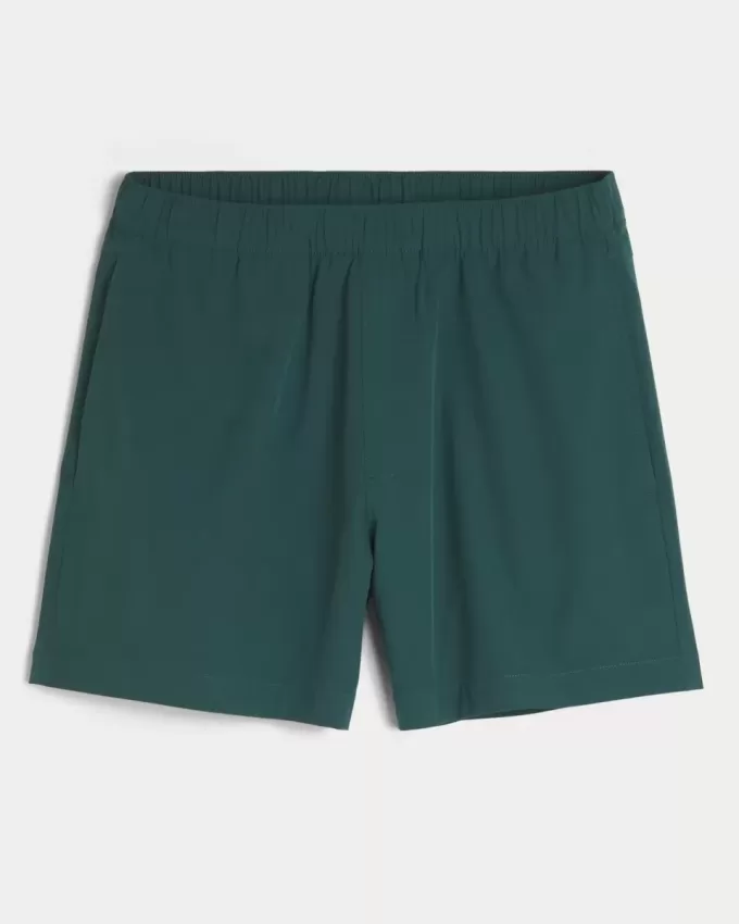 Pantaloni scurți activi hibridi la jumătatea coapsei Pantaloni scurți activi hibridi la jumătatea coapsei