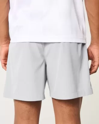 Pantaloni scurți activi hibridi la jumătatea coapsei