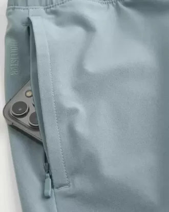 Pantaloni scurți activi hibridi la jumătatea coapsei Pantaloni scurți activi hibridi la jumătatea coapsei