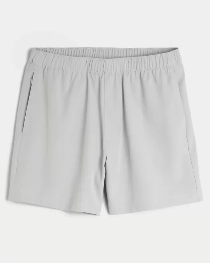 Pantaloni scurți activi hibridi la jumătatea coapsei Pantaloni scurți activi hibridi la jumătatea coapsei
