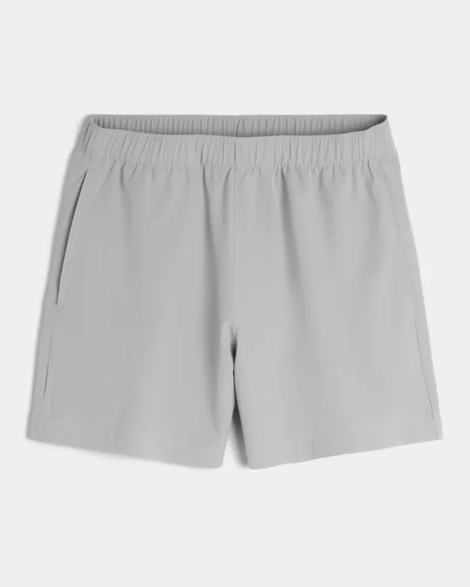 Pantaloni scurți activi hibridi la jumătatea coapsei