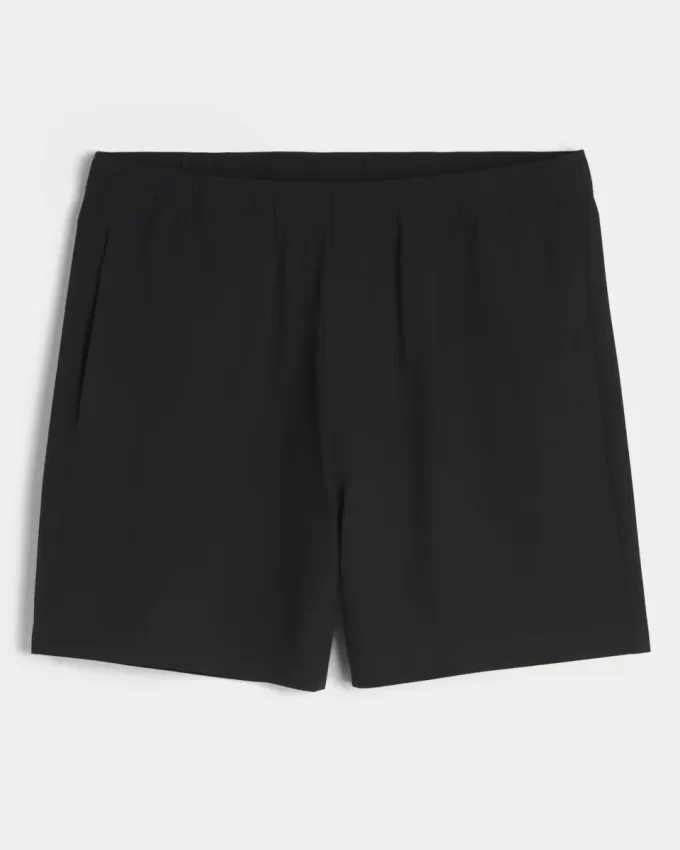 Pantaloni scurți activi hibridi la jumătatea coapsei Pantaloni scurți activi hibridi la jumătatea coapsei