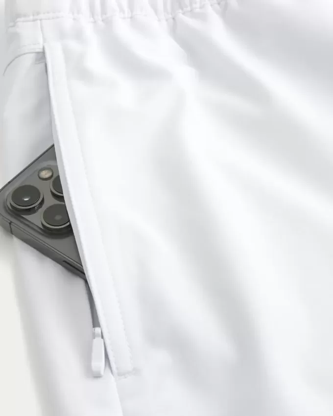 Pantaloni scurți activi hibridi la jumătatea coapsei