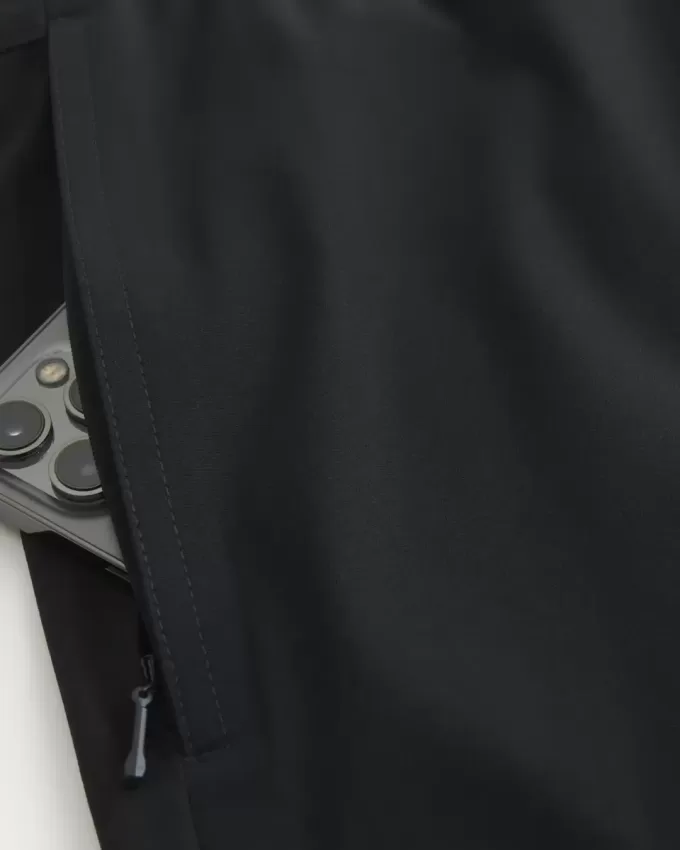 Pantaloni scurți activi hibridi la jumătatea coapsei Pantaloni scurți activi hibridi la jumătatea coapsei